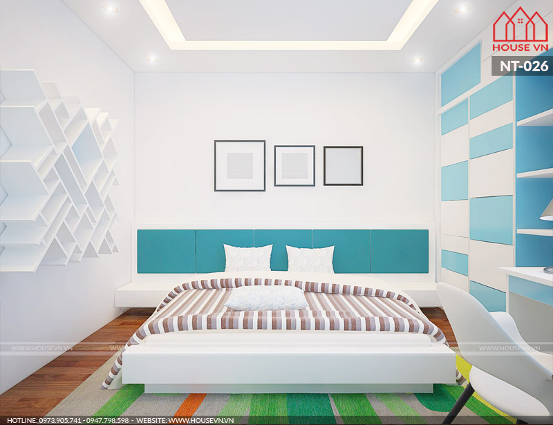 Di chuyển sang căn phòng ngủ dành cho bé trai của gia đình với màu sắc kết hợp trắng và xanh khá nổi bật tạo sự thích thú cho bé